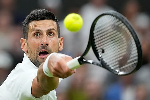Novak Djokovic return the ball to Hulger Rune